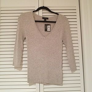 Quarted sleeved sweater